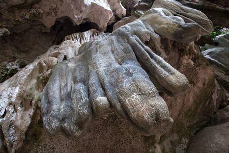Writing on stone in cave by unconscious human.の写真素材