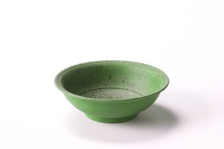 Close up Ceramic green bowl isolated on white background shoot in the studio with space for copy.の写真素材
