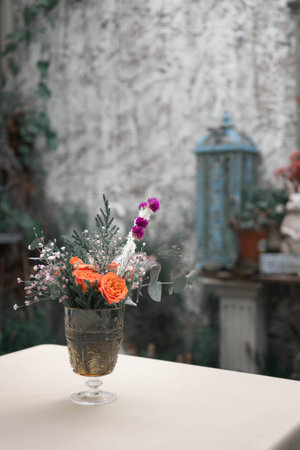 Flower (rose) vase in the garden vintage style.の写真素材