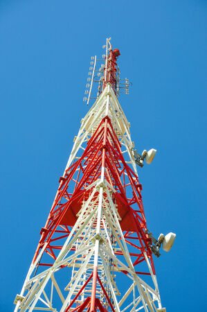 Communication tower in a clear blue sky day Communication tower in a clear blue sky day