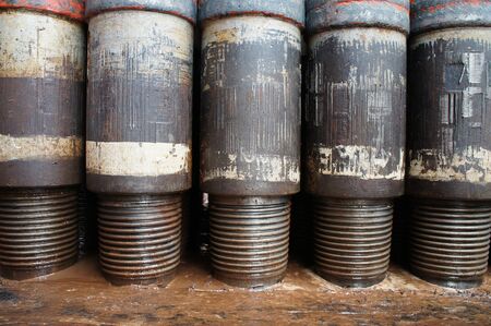 Row of Tool Joint at Pin End of Drillpipe Standing On the floorの写真素材