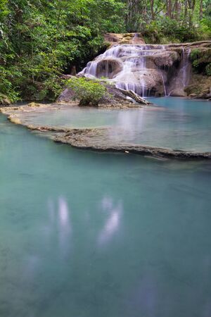 Deep forest waterfall - Erawan Waterfall in Thailandの写真素材