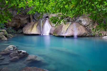 Deep forest waterfall (Erawan Waterfall) in Thailandの写真素材