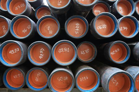 Stack of oil well casing 9 5/8 Inch