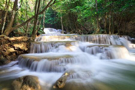 Deep forest Waterfall in Kanchanaburi, Thailandの写真素材