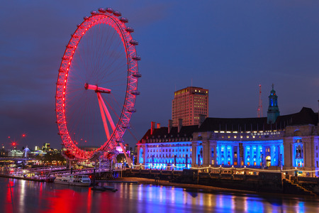 LONDON, UNITED KINGDOM  22 MAY 2016: London Eye is the tallest Ferris wheel in Europe, Big Ben and Country Hall in London, United Kingdomのeditorial素材