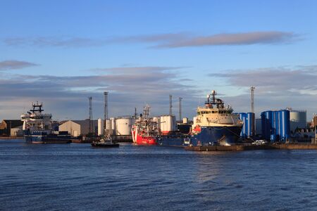 ABERDEEN SCOTLAND - 27 JANUARY 2016: Big supply boats in Abeerden harbor on 27 January 2016. Aberdeen port is one of the busiest ports in UK.のeditorial素材