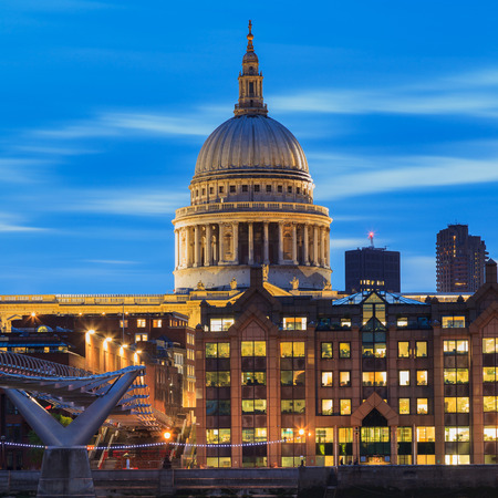 Millennium Bridge leading to Saint Paul's Cathedral during sunset in central London, UKのeditorial素材