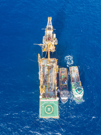 Aerial View of Tender Drilling Oil Rig (Barge Oil Rig) in The Middle of The Ocean