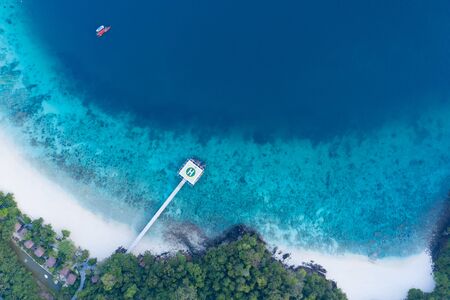 Aerial view from a drone of beautiful Nyaung Oo Phee island on sunny day in Myanmar