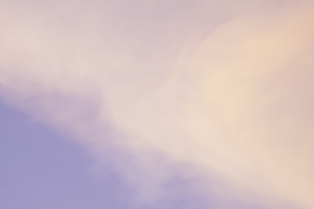 Imagine the dream of looking at a warm life, touching the warmth of the sun and the sky, shining in orange and pink.の写真素材