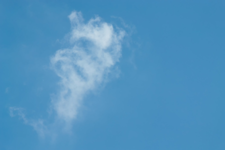 The sky with the clouds moving in the wind is a small group of clouds.の写真素材