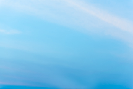 Looking at the sky with the wind blowing through.の写真素材