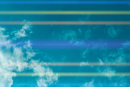 Blue sky background with tiny clouds. White fluffy clouds in the blue skyの写真素材