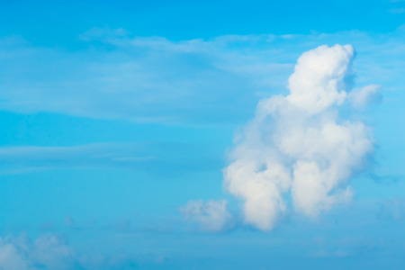 Clouds are divided into layers in the evening with light.