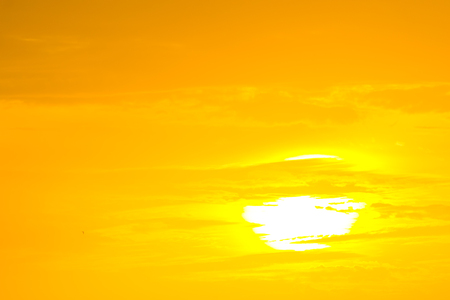 The golden sun in the morning of a new day on the sea in the Gulf of Thailandの写真素材