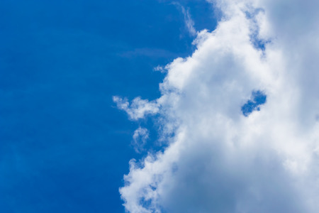 The sky is a small cloud floating in the sky.の写真素材