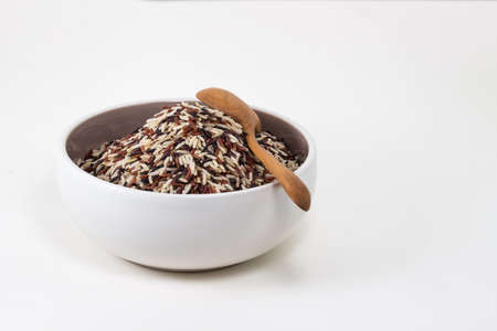 Thai Fragrant Rice in the bowl on white backgroundの写真素材