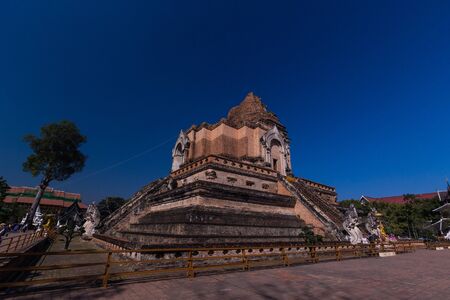 Wat Chedi Luang is a Buddhist temple in the historic centre of Chiang Mai, Thailand