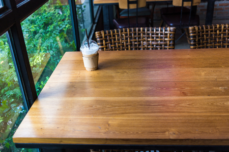 Ice latte coffee on the tableの写真素材