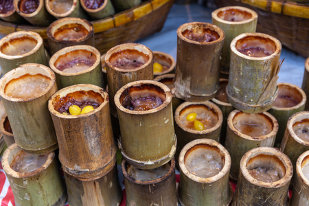 Glutinous Rice Roasted in Bamboo Joints (Khao Larm)  Sterilized Thai Dessertsの写真素材