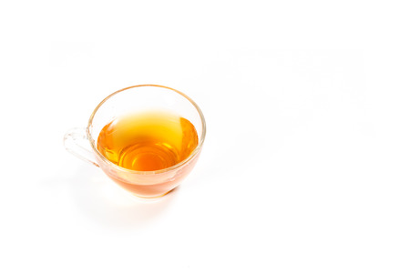 Cup of bael fruit tea white backgroundの写真素材