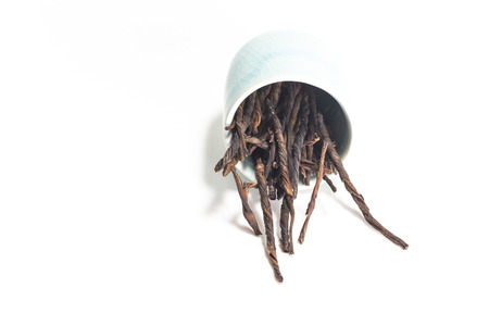 Dried chinese tea leave on white backgroundの写真素材