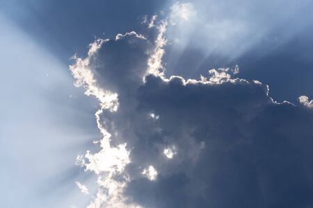 Sun ray with blue sky and cloud