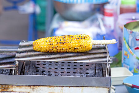 Closeup grilled corn vegetable food backgroundの写真素材