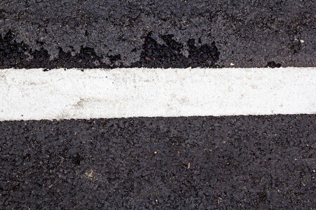 new white line on the road textureの写真素材
