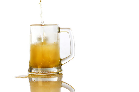 Frosty glass of light beer set isolated on a white backgroundの写真素材