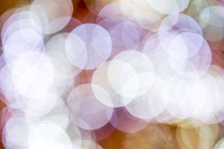 Christmas background. Festive abstract background with bokeh defocused lights and starsの写真素材