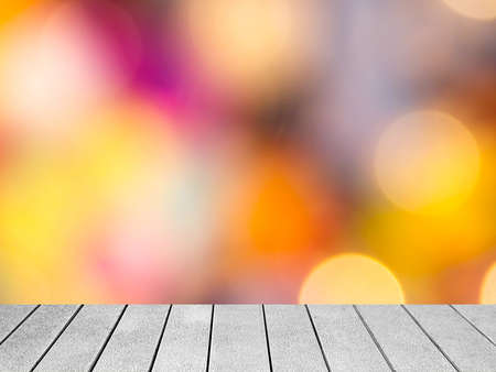 Abstract colourful Bokeh background with wooden planksの写真素材