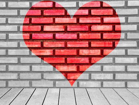 Wooden board background brick wall red heart.の写真素材