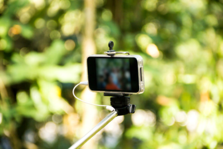 selfie photograph stick monopodの写真素材