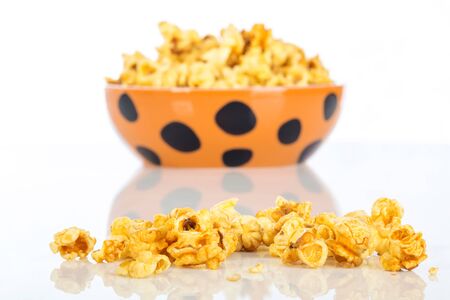 Glass ceramic bowl popcorn on white backgroundの写真素材