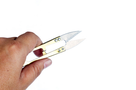 Scissors for thread cutting isolated on white background