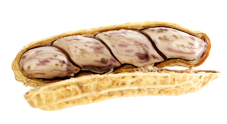 Peanuts in close up on a white background