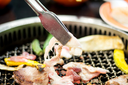 Soft focus barbecue or grilling porkの写真素材