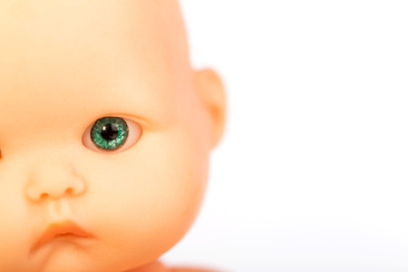 baby doll isolated on white backgroundの写真素材