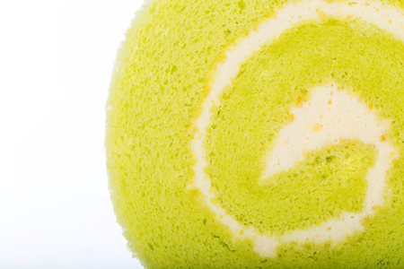 Matcha cake rolls isolated on white backgroundの写真素材