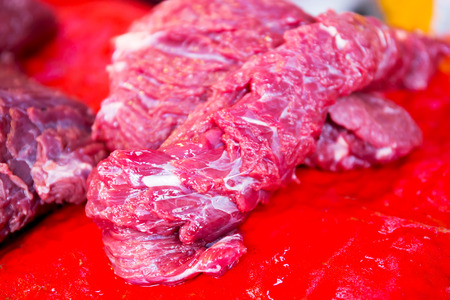 fresh raw meat fillets at the marketの写真素材