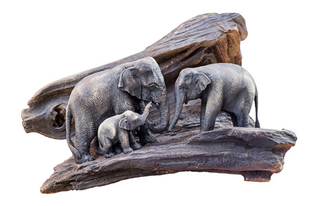 Carved wooden elephant isolated white backgroundの写真素材