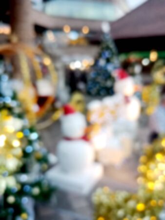 Blurred big bright Christmas tree decorated. Bokeh backgroundの写真素材
