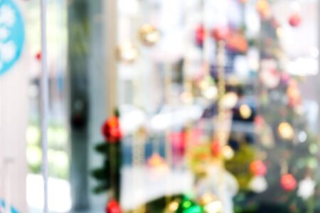 Blurred big bright Christmas tree decorated. Bokeh backgroundの写真素材