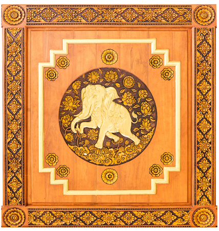 Traditional Thai style wood carving elephant of 12 Zodiac,on the wall of temple in Thailandのeditorial素材