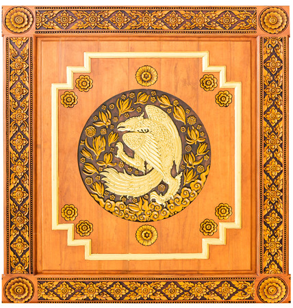 Traditional Thai style wood carving cock of 12 Zodiac,on the wall of temple in Thailandの写真素材
