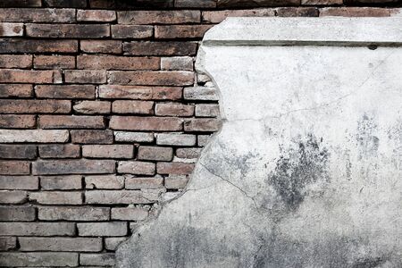 old wall with cracks backgroundの写真素材