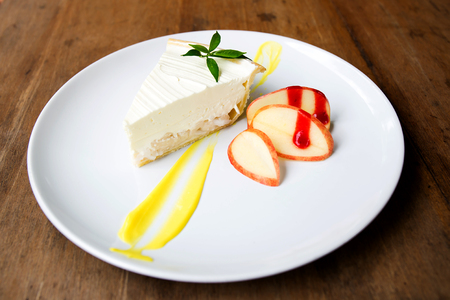 Coconut cake on white plate on tableの写真素材
