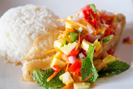 Soft rice and grilled fish Dolly bento with vegetables, selective focus.の写真素材